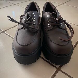 Women’s chunky brown leather Moc-Toe boat shoes